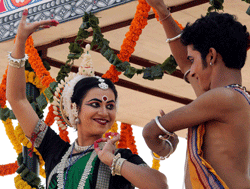 Artists from Odisha perform on their State's tableaux during a press preview for the Republic Day parade in New Delh on Tuesday. PTI