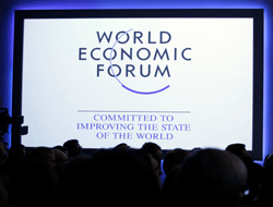 Delegates listen to a speaker during the annual meeting of the World Economic Forum (WEF) in Davos January 25, 2013. REUTERS