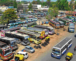 Private and BMTC buses are parked haphazardly in Kalasipalya bus terminal