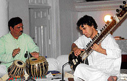 meditative Vishwanath Nakod and Paul Livingstone.