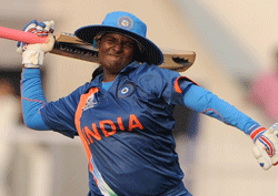 Indian cricketer Thirush Kamini celebrates her century during the inaugural match of the ICC Women's World Cup 2013 between India and West Indies at the Cricket Club of India's Brabourne stadium in Mumbai on January 31, 2013. AFP