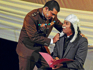 Hilarious Kishore Acharya (left) in the play.
