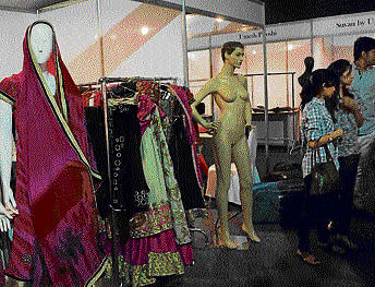 few takers Many of the stalls were empty at the Bangalore Fashion Week held recently. DH photo by shivkumar b h