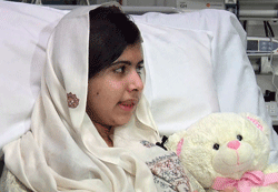 Pakistani schoolgirl, Malala Yousufzai, who was shot in the head by the Taliban for advocating girls' education, is seen sitting in her hospital bed in this undated still picture taken from video provided by the Queen Elizabeth Hospital, in Birmingham, central England, and received in London on February 4, 2013. Yousufzai has undergone successful surgery to reconstruct her skull and help restore lost hearing. REUTERS