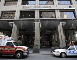 A New York City Fire Department ambulance and a New York Police car are seen parked in front of The Standard and Poor's building in New York August 8, 2011.  Reuters photo