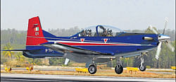 A Pilatus PC-7 trainer, now the smallest aircraft in the IAFs inventory, lands at IAF Station Yelahanka on Tuesday. DH photo