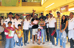Kumar, winner of flash mob conducted by Lets do it! Mysore is seen with the team at Mall of Mysore. (Pic by  special arrangement)