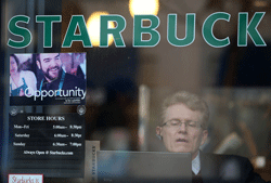 A sign advertising jobs is posted in the window of a Starbucks Coffee shop on February 7, 2013 in San Francisco, California. According to a Labor Department report, weekly jobless claims dropped 5,000 to 366,000 in the week ending on February 2. AFP photo