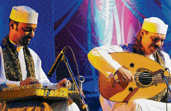 Middle eastern charm: Hamada Farghally (left) on qanoon, performs with his father Mohamed Farghally, who is playing an oud. Photo by Srikanta Sharma R