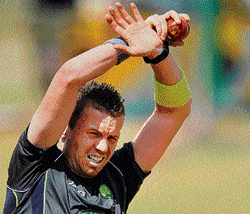 Getitng ready:  Aussie paceman Peter Siddle stretches during a practice session in Chennai on Saturday. pti