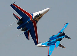 Russian air force aerial demonstration team's Sukhoi Su-27 fighters of the Russian Knights perform on the fourth day of the Aero India 2013 at Yelahanka air base in Bangalore, India, Saturday, Feb. 9, 2013. More than 600 aviation companies along with delegations from 78 countries are participating in the five-day event that started Wednesday. AP Photo