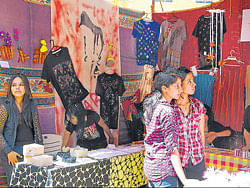 Keen: Visitors at one of the stalls.