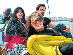 Relaxed: Ekta Kapoor (L) with Emraan Hashmi and Huma Qureshi at the Mahakumbh.