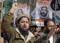 Supporters of various political religious parties take part in an anti-India demonstration, to condemn the hanging of Mohammad Afzal Guru, in Muzaffarabad, capital of Pakistan-administrated Kashmir. Reuters