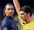 Youre out :Referee Paolo Tagliavento shows red card to Pa-ris Saint Germains Zlatan Ibrahimovic on Tuesday. reuters