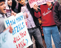 Demonstrators protesting against the hasty hanging and burial of Jaish-e-Mohammed terrorist Afzal Guru in  Tihar Jail in Delhi.