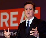 British Prime Minister David Cameron gestures while addressing the Indo- British Business Summit in Mumbai on Monday during his visit to India. PTI Photo