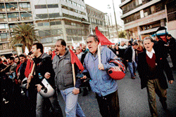 On the boil : Member of the Greek Communist trade  union shout slogans against austerity measures in Athens. AfP