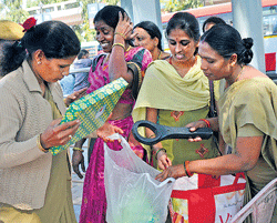 Taking no chances: Police personnel search baggage of passengers at the Kempegowda  bus stand on Friday. dh Photo