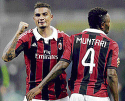STRIKE FORCE Kevin-Prince Boateng (left) and Sulley Muntari did the damage for AC Milan against Barcelona in the Champions League. AP