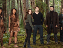 FILE- This undated file photo provided by Summit Entertainment shows, from left, Judith Shekoni, Tracey Heggins, Kristen Stewart, Robert Pattinson, Christian Camargo, Peter Facinelli and Casey LaBow in a scene from the film 'The Twilight Saga: Breaking Dawn - Part 2.' The finale to the blockbuster supernatural romance dominated the 33rd Annual Razzie Awards on Saturday, Feb. 23, 2013 with seven awards, including worst actress for Kristen Stewart, supporting actor for Taylor Lautner, director for Bill Condon and worst screen couple for Lautner and child co-star Mackenzie Foy. AP Photo