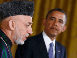 Afghan President Hamid Karzai (L) addresses a joint news conference with U.S. President Barack Obama in the East Room of the White House in Washington, January 11, 2013. REUTERS photo