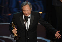 Best Director winner Ang Lee accepts the trophy onstage at the 85th Annual Academy Awards on February 24, 2013 in Hollywood, California. AFP PHOTO