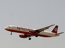 In this photograph taken on March 20, 2012 a Kingfisher Airlines Airbus A321 aircraft makes its final approach for landing at the Chatrapati Shivaji International Airport in Mumbai. India's government withdrew international flying rights and domestic slots February 25, 2013 from debt-laden Kingfisher Airlines, grounded since last October -- making more seats available for rival carriers. AFP FILE PHOTO/