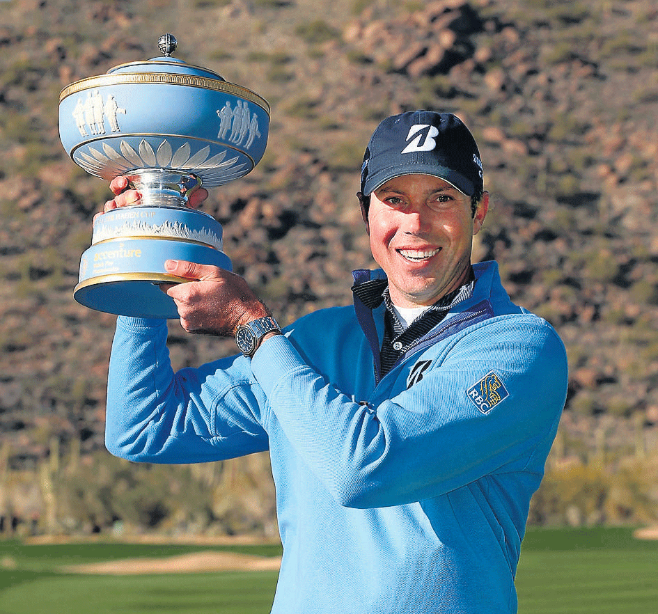 Over the moon: Matt Kuchar celebrates with the Match Play Championship trophy in Arizona on Sunday. AFP