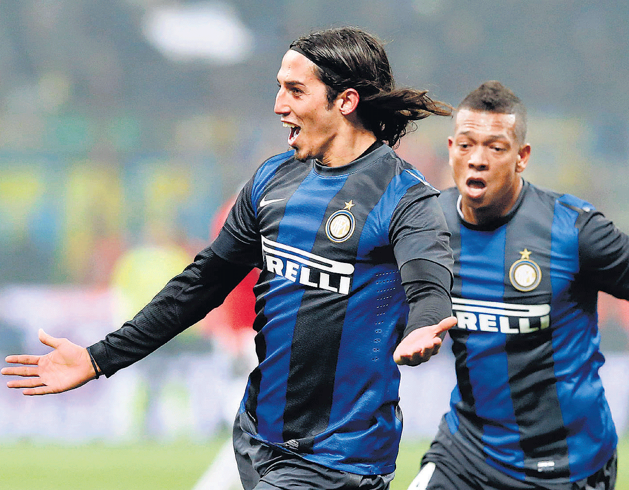 Fine finish: Inter Milans Ezequiel Schelotto exults after scoring the equaliser against arch-rivals AC Milan during their Serie A match at the San Siro on Sunday night. reuters