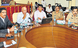 State Home Department Principal Secretary V Umesh addresses a meeting of the officers to discuss on the security measures to be taken in the coastal belt, at the Deputy Commissioners office in Mangalore on Monday.