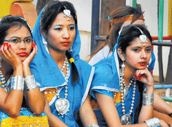 Girls wait for the Indian dance event.