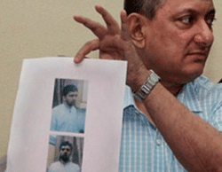 Mumbai ATS chief Rakesh Maria showing the picture absconding terrorist Yasin Bhatkal mastermind of the 13/7 Mumbai blasts. File PTI Image