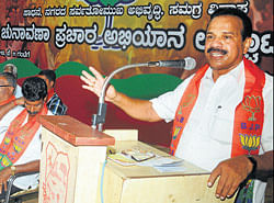 Former Chief Minister D V Sadananda Gowda addressing a gathering at a poll campaign in Mangalore on Thursday. DH photo