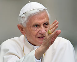 Pope Benedict XVI waves to pilgrims. AFP Photo