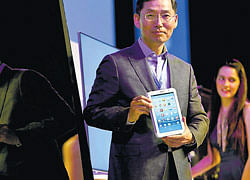 Samsung SouthWest Asia President and CEO B D Park  displays a Galaxy Note 510 during its launch in Hyderabad on Friday. AP