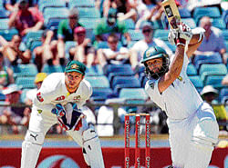 South African batsman Hashim Amla drives one en route his epic 196 against Australia in Perth on Sunday. AFP
