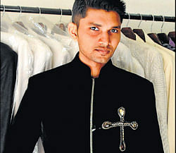Shifaz, I year, MBA correspondence, Manipal University, wore a silk and velvet black jacket with Swarovski embellishment work and matched it with a pair of black trousers.