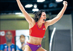 Jenn Suhr celebrates after setting a  women's indoor pole vault world record on Saturday. REUTERS
