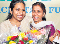 Vidya Pillai (left) and R Umadevi Nagaraj in a jovial mood after being honoured by the KSBA. DH PHOTO