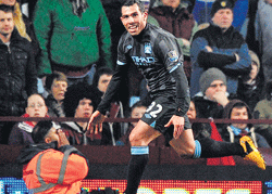 Manchester Citys Carlos Tevez celebrates after scoring against Aston Villa during their English Premier League match on Monday. AFP