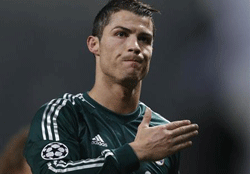 Real Madrid's Cristiano Ronaldo reacts after the Champions League soccer match against Manchester United at Old Trafford stadium in Manchester, March 5, 2013.  Credit: Reuters/Phil Noble