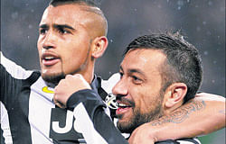 Juventus Fabio Quagliarella (right) celebrates with Arturo Vidal after scoring against Celtic FC during their Champions League pre-quarterfinal match on Wednesday. AFP