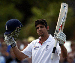 England's captain Alastair Cook celebrates reaching a century during the fourth day of their first test cricket match against New Zealand at the University Oval in Dunedin March 9, 2013. REUTERS