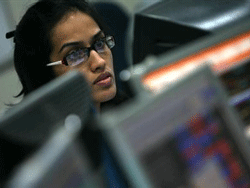 A broker looks at a computer screen at a stock brokerage firm in Mumbai July 6, 2009.  Credit: Reuters