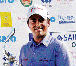delighted: Anirban Lahiri is all smiles after winning the SAIL-SBI Open trophy on Saturday.
