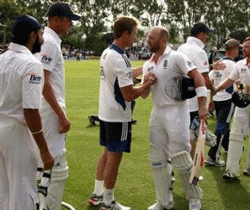 England team players shake hands with batsmen Matt Prior (C) and Ian Bell (R) as they walk off the ground at the end of the first test against New Zealand at the University Oval in Dunedin March 10, 2013.  Credit: Reuters/