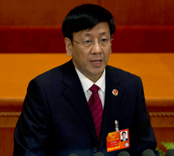 China's Procurator-General Cao Jianming addresses a plenary session of the National People's Congress at the Great Hall of the People in Beijing, China, Sunday, March 10, 2013. During the session, the Cabinet unveiled its plan to streamline government ministries, doing away with the powerful Railways Ministry and creating a super-agency to regulate the media and realigning other bureaucracies in a bid to boost efficiency. (AP Photo