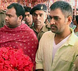 Indian cricket captain Mahendra Singh Dhoni arrives to offer prayers at the ancient Deori temple in Tamar, about 65 kms from Ranchi on Saturday. PTI Photo