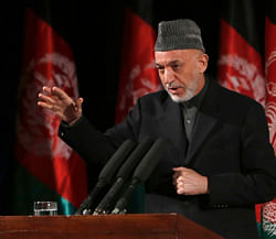 Afghan President Hamid Karzai gives a speech during an event to mark International Women's Day in Kabul March 10, 2013. REUTERS